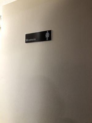 Women bathroom sign