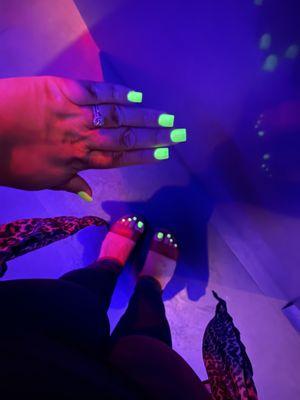 Unbeknownst to me, my nails glow in the dark! Funny surprise! (Regular polish, not gel.)