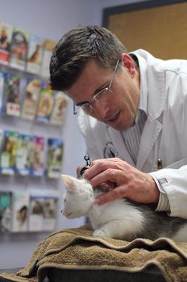 Dr. Eric being gentle with baby