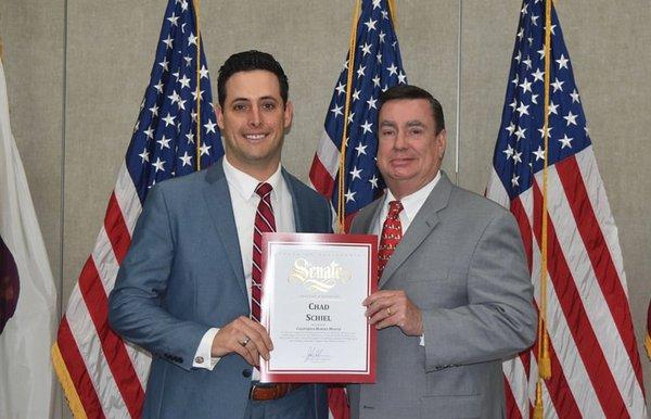 Senator Joel Anderson awards Chad Schiel the California "Unsung Heroes Award" for 2017.