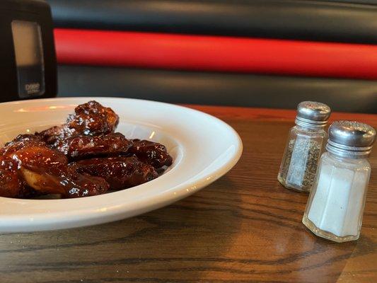 Brick oven baked wings tossed with BBQ sauce