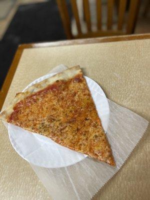 A slice of Louie and Ernie's Pizza