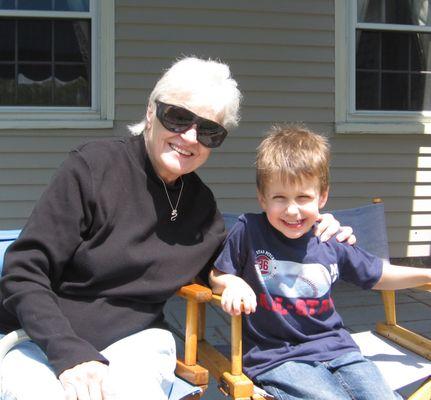 A happy client enjoying the day with her grandson!