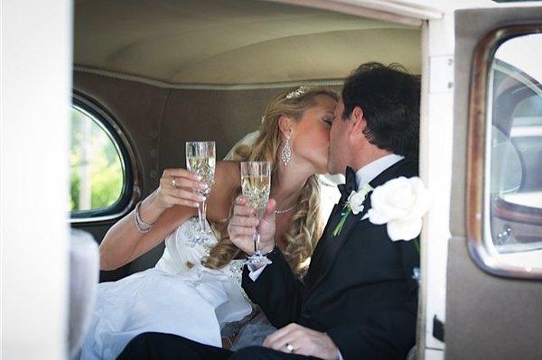 Cheers to a very happy marriage! 1937 Packard wedding car