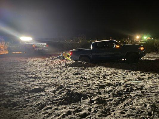 Our truck getting pulled out by the 4x4 recovery vehicle