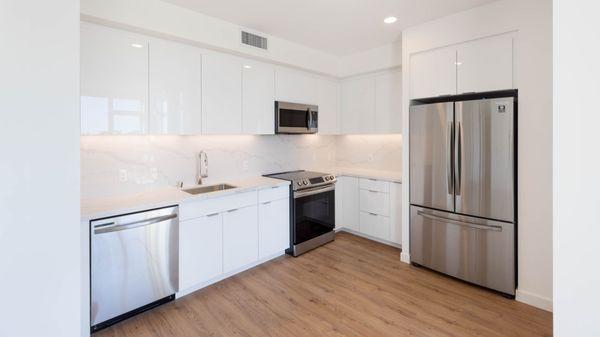 Kitchen with Quartz Countertops and Stainless Steel Appliances