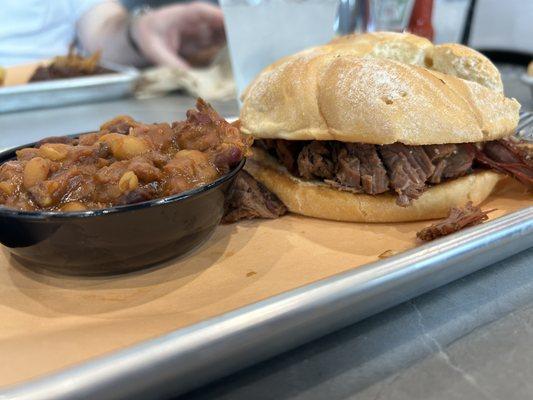 Brisket sandwich and settlers beans