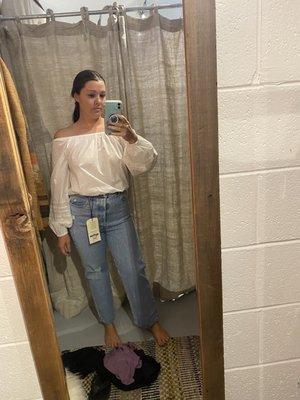 Levi's and white blouse