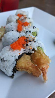 Shrimp tempura sushi is on the happy hour menu.