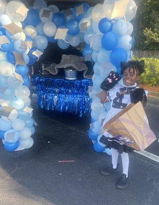 A truly happy little girl in her custom fitted costume courtesy of Park Place Owner/seamstress Sheila