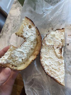 Everything bagel with butter and cream cheese