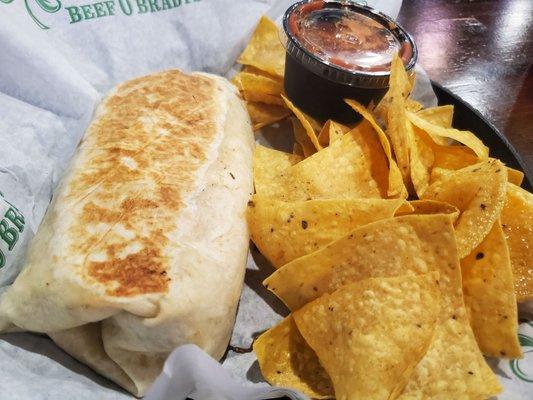 Steak burrito with chips and salsa