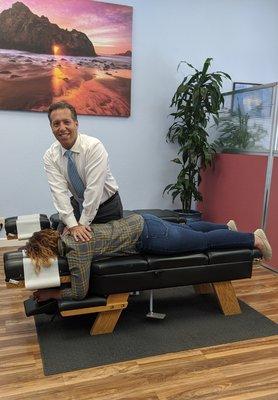 *pre-Covid picture*
Dr. Kleinberg adjusting one of our loyal practice members!