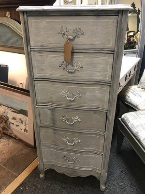 Lingerie chest painted in a light gray and white mix.