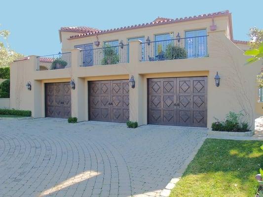 Spanish style carriage house garage doors