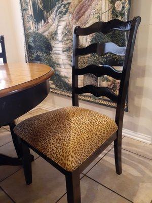 Cheetah upholstered chairs for the kitchenette.  The piping on each chair is perfect!