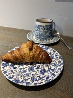 Drip coffee and plain croissant.