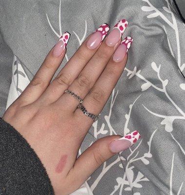 Gel pink and white French with cow print.