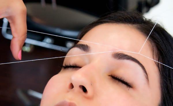 Threading eyebrows