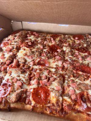 Meat lovers thick crust pizza