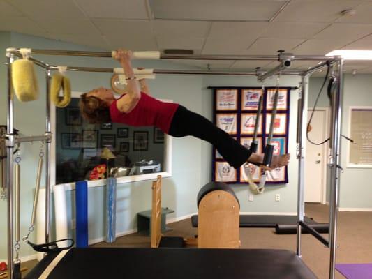 Judy Hearn, age 75 performing pull-ups!  client at my studio for 13 years!