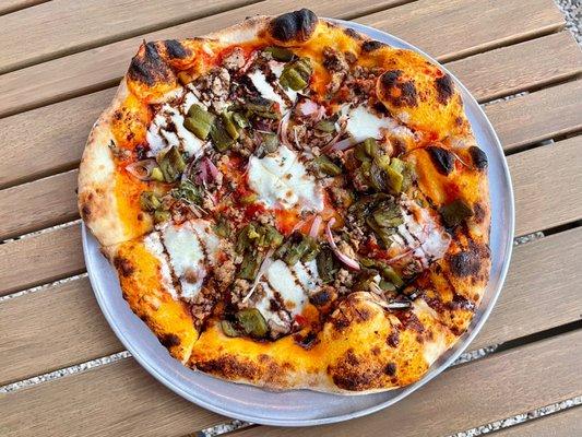 The "S & P": crumbled Italian sausage, roasted bell peppers, fresh mozzarella, pomodoro, red onion, rosemary, balsamic glaze