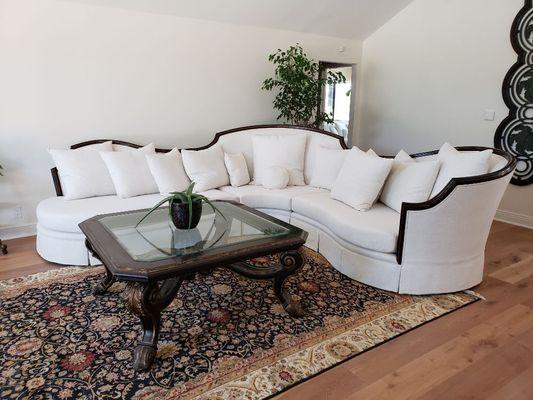 This is a reupholstered large sectional with crypton fabric.