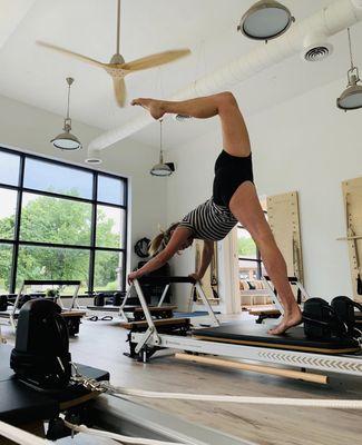 Pilate stretch on the reformer