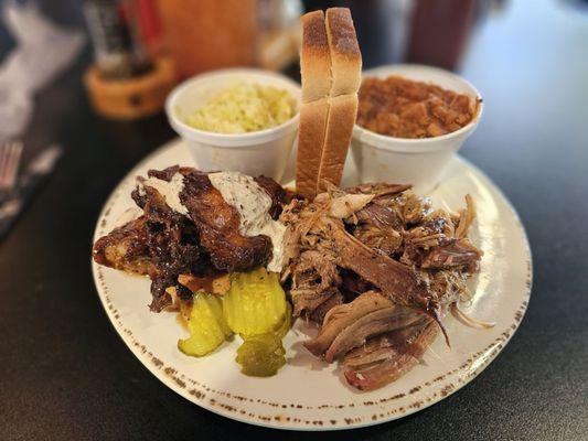 Combo Plate; Pulled Pork and Smoked Chicken with Baked beans and Coleslaw.