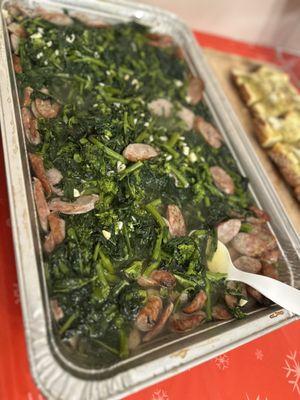 Delicious sweet sausage and fresh broccoli rabe with plenty of garlic