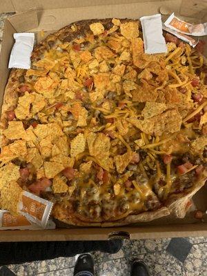 This is the taco pizza we got after waiting 20 minutes longer than it was supposed to be done.