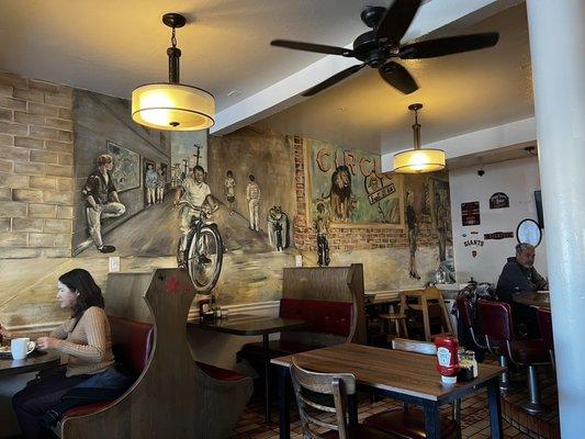 Nice mural and cozy dining room.