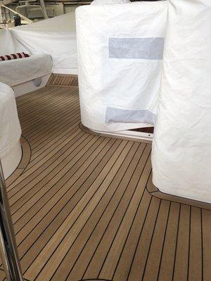 Freshly cleaned and sealed teak on 66ft Sunseeker