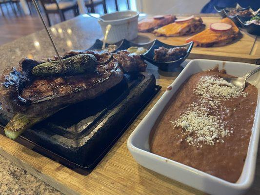 Ribeye ordered medium rare. The refried beans were fantastic, maybe the best in Kitsap County.