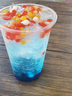 Blue Razz Italian soda with Rainbow popping boba