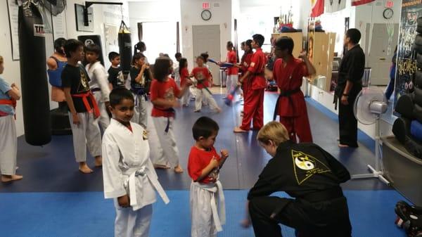 Big class! Our higher belts leading by example and helping the lower ranks improve!