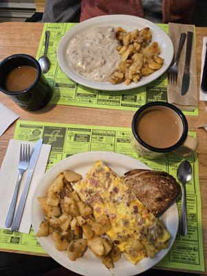 sausage gravy over biscuits with home fries, decaf coffee.  meatlover omelet rye toast and home fries, regular coffee .