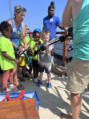 Hoisting the found treasure