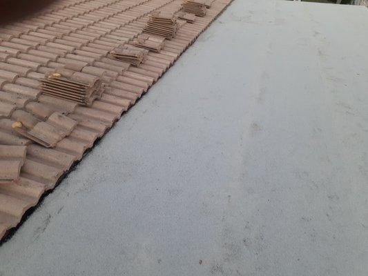 Slope Tile to Flat Roof Repair. BELLCAST CONSTRUCTION, LLC.