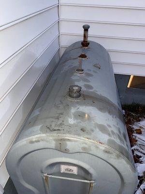 Heating oil spilled on our oil tank and house by Petro