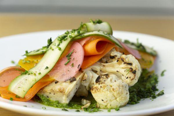 Cauliflower 'Steak': 
Marinated and grilled cauliflower topped with pickled vegetables and
house-made green goddess dressing.