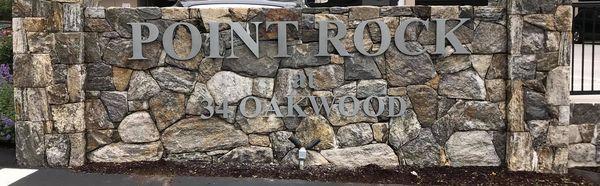 Aluminum Letters on a rock wall