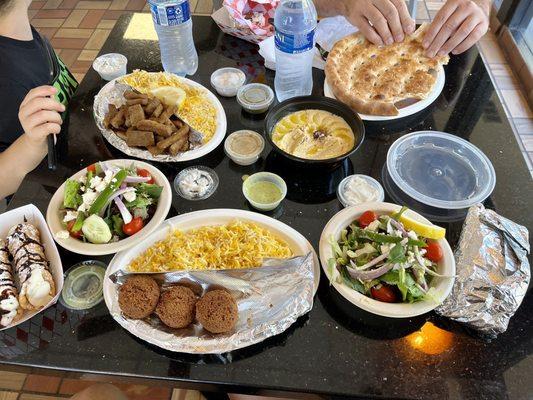 Gyro plate, falafel, pita and hummus, they threw in cannolis (not my fav but so sweet/kind of them).