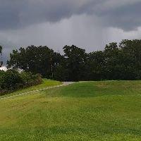 The back 9 with a storm on the horizon at Diamond Hill Golf Club, Valrico Florida