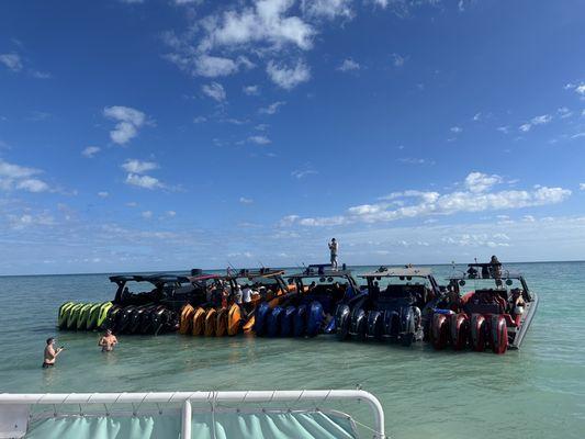 Other boats at sandbar, cool shells found, and food from the food boat!