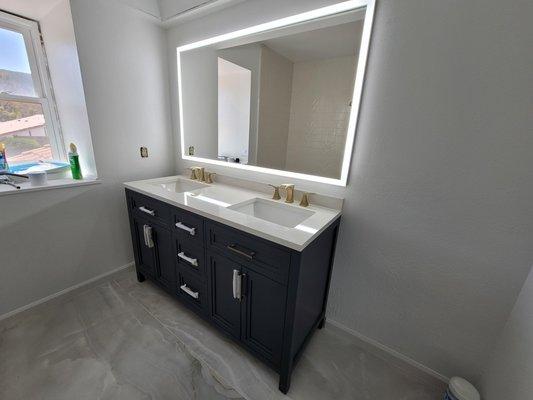 bathroom vanity and ceramic installation.