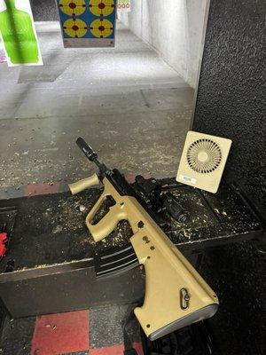 Gun range and a custom aug built by GA firing line