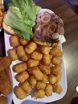 Burger with grilled purple onion and tots