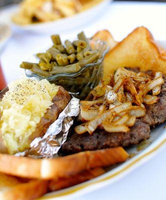 A half pound of tender ground beef grilled to order. Comes with 2 sides!