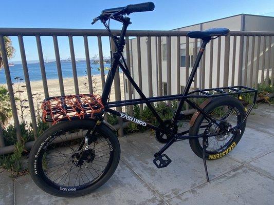 Mini cargo bike with custom wheel set built by Main Street Cyclery